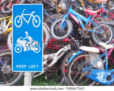 Traffic sign old bicycles  blur bicycles