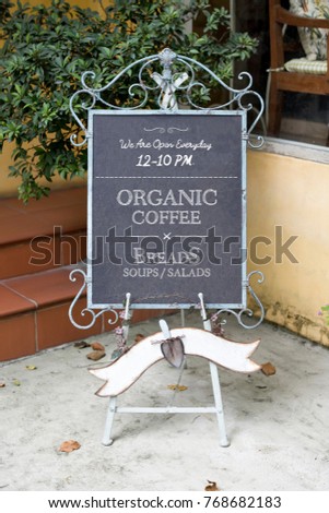 Signage outside a coffee shop