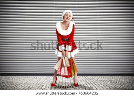 Santa claus woman and gray background 