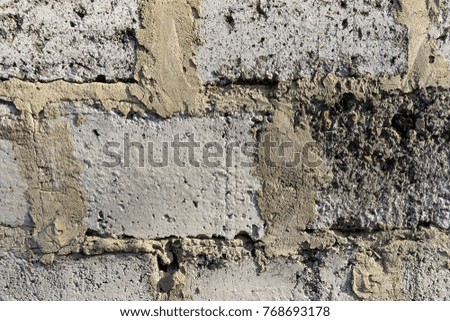 grey old wall of concrete cement blocks texture background,  gray weathered cement bricks