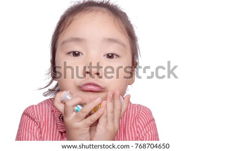 A lovely young asian girl before the white background