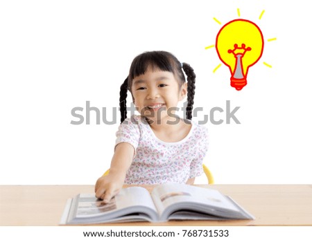 asia child read a book with the light bulb picture on white background