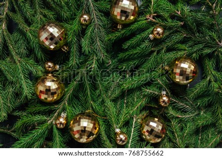 Christmas background. green background. Real tree. Background for text. Christmas toys