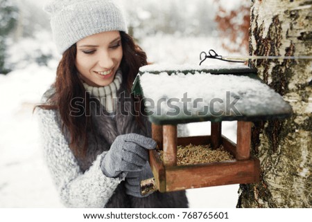 feeding birds in the winter