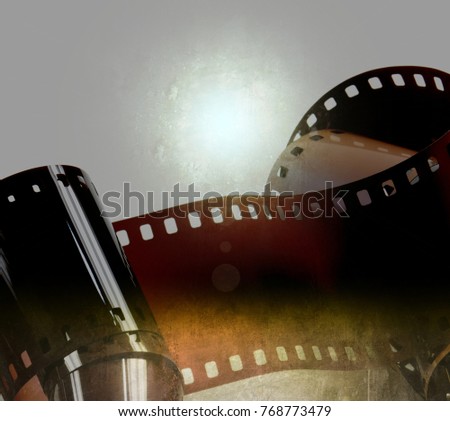 Twisted film strip on gray background.