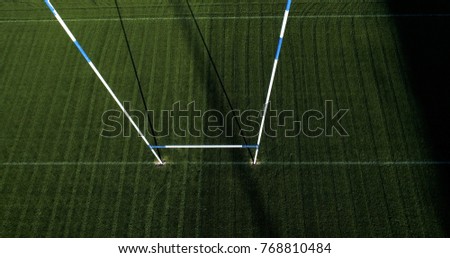 rugby stadium with pole in aerial view