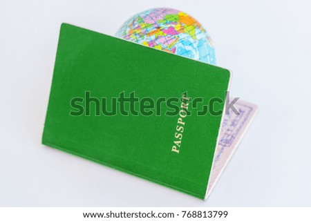 Globus is a green passport on a white background