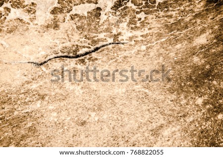 Brown leather with cracks background texture.