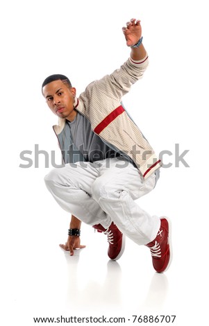 Portrait of African American hip hop dancer performing isolated over white background