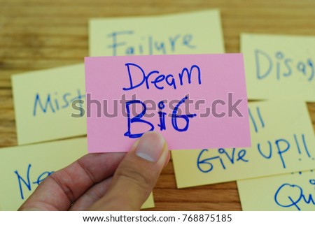 Motivation word " dream big" on pink card