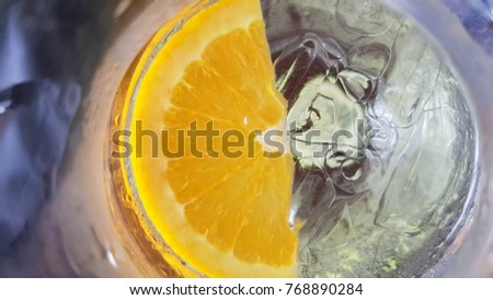Fresh lemon dropped in cool drink water