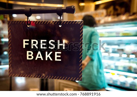 Sign with "Fresh Bake" Printed inside a local Bakery