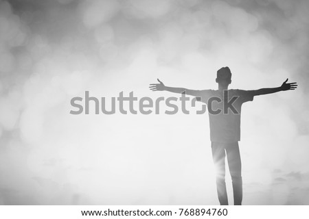 Humble man and hands rise up on beautiful morning background concept for self confidence in relax emotional, He risen from wellbeing and have a good day, Christian stocker hope in financial freedom Royalty-Free Stock Photo #768894760