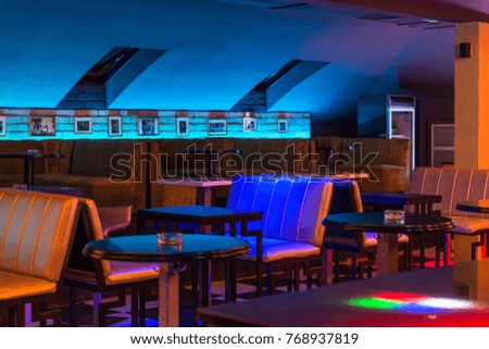Tables and seatsin restaurant interior
