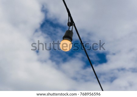 Light bulb lamps with blue sky