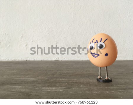 Happy of egg standing on the floor