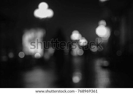 black and white blurred city