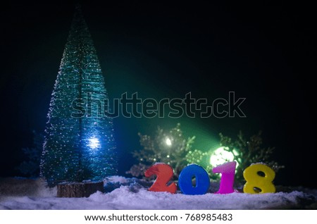 New Years Eve celebration background with new year elements or symbols. Decoration for greeting card. Happy new year. With dark background. Selective focus