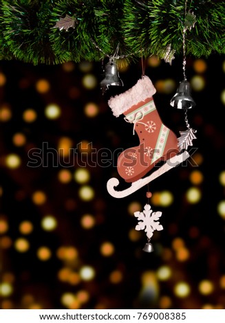 Christmas tree skates toy and ball decorated boke. Christmas holiday celebration concept.