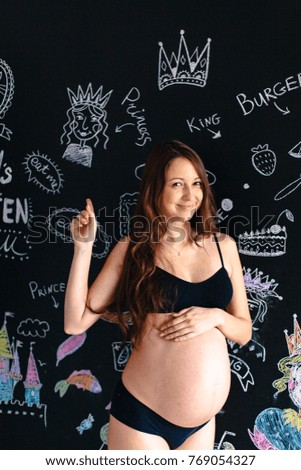 Healthy pregnant woman guessing about future gender of her baby