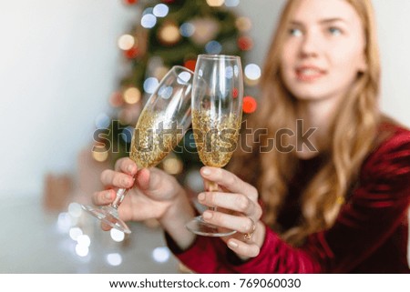girl with the glasses. Portrait of a girl. Girl smiling. Girl celebrates Christmas