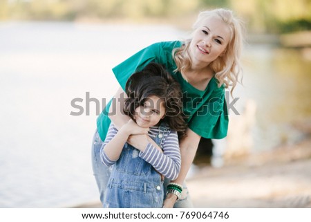 Mother and daugther spending time together at the nature