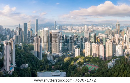 Aerial Panoramic view of Hong Kong Island and Kowloon Skyline over Victoria Harbour in Day Time