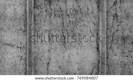 wall of concrete panels background texture, old weathered cement slab