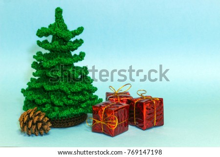 gambling Christmas tree with a bump and gift packages on a blue background