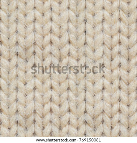 Seamless Texture of Knitted Sweater. Repeating pattern of beige knitted sweater