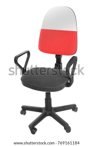The Polish flag - on the back of a chair. Isolated on white background.