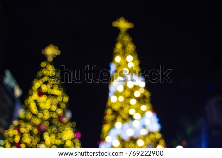 Christmas decoration background with golden lights glowing