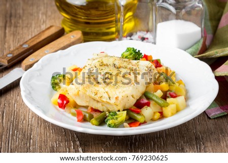 White fish fillet with vegetable stew,  healthy food, delicious homemade lunch