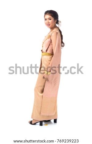 Southeast Asian woman full body posing in Thai period costume, Thai period dress or
Traditional Thai Costumes isolated on white background.