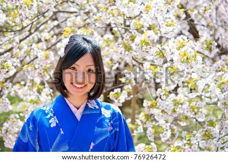 a portrait of japanese kimono woman and cherry blossom
