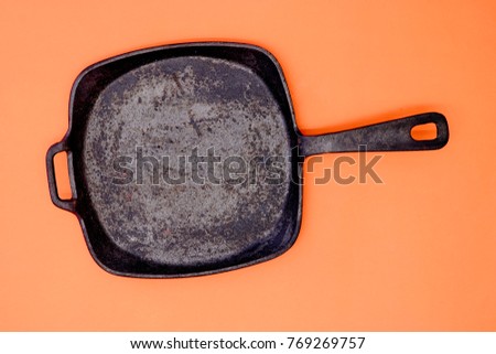 A studio photo of a frying pan skillet