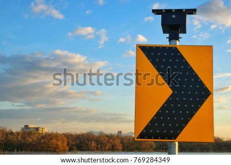 Traffic signs using solar energy. Natural background. Relax in evening. 