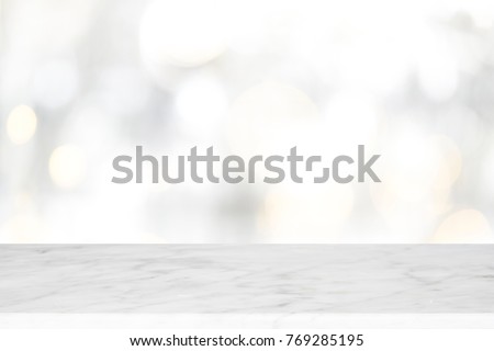 Wood table top on white bokeh abstract background and used for montage or display products
 Royalty-Free Stock Photo #769285195