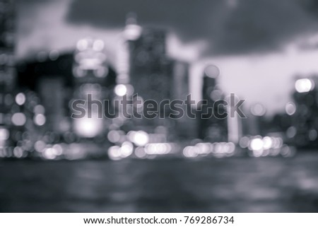 Blur image of Hong Kong night view with circle bokeh, b&w color