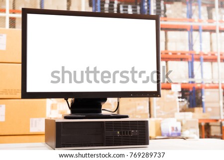 computer with blank screen in warehouse factory