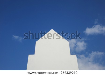 White wall, blue background