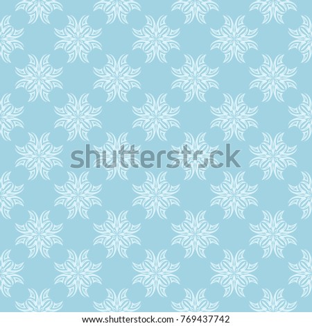 White floral pattern on blue background. Seamless ornament for textile and wallpapers