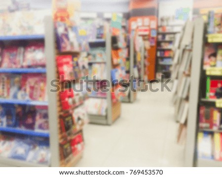 Vintage style color tone . Blur image of a bookstore .