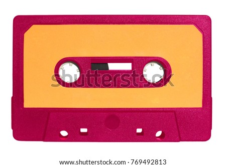 pink magnetic tape cassette for analog audio music recording with yellow label isolated over white background