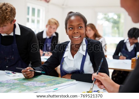 Group Of Teenage Students Studying Together In Art Class Royalty-Free Stock Photo #769521370
