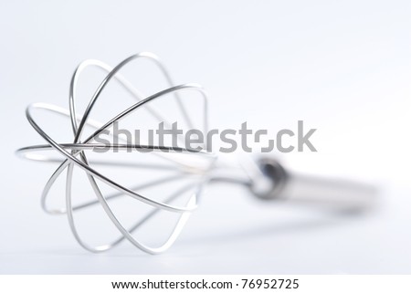Kitchen whisk isolated on white
