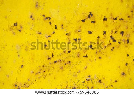 Yellow old rusty background. grunge material. Damaged metal surface. Scratched plate