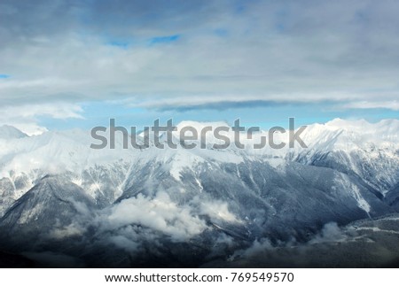 Magic landscape with mountains and skies, top view in Sochi