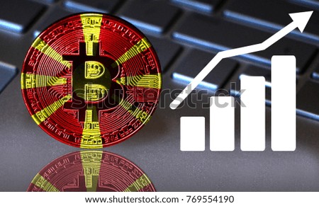 Bitcoin close-up on the keyboard background, the Macedonia flag is shown on the bitcoin.