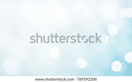 Amazing Winter Background. Delicate Beautiful Christmas Blue White Backdrop with light spot. Wide Screen Soft Texture With Copy Space for text.